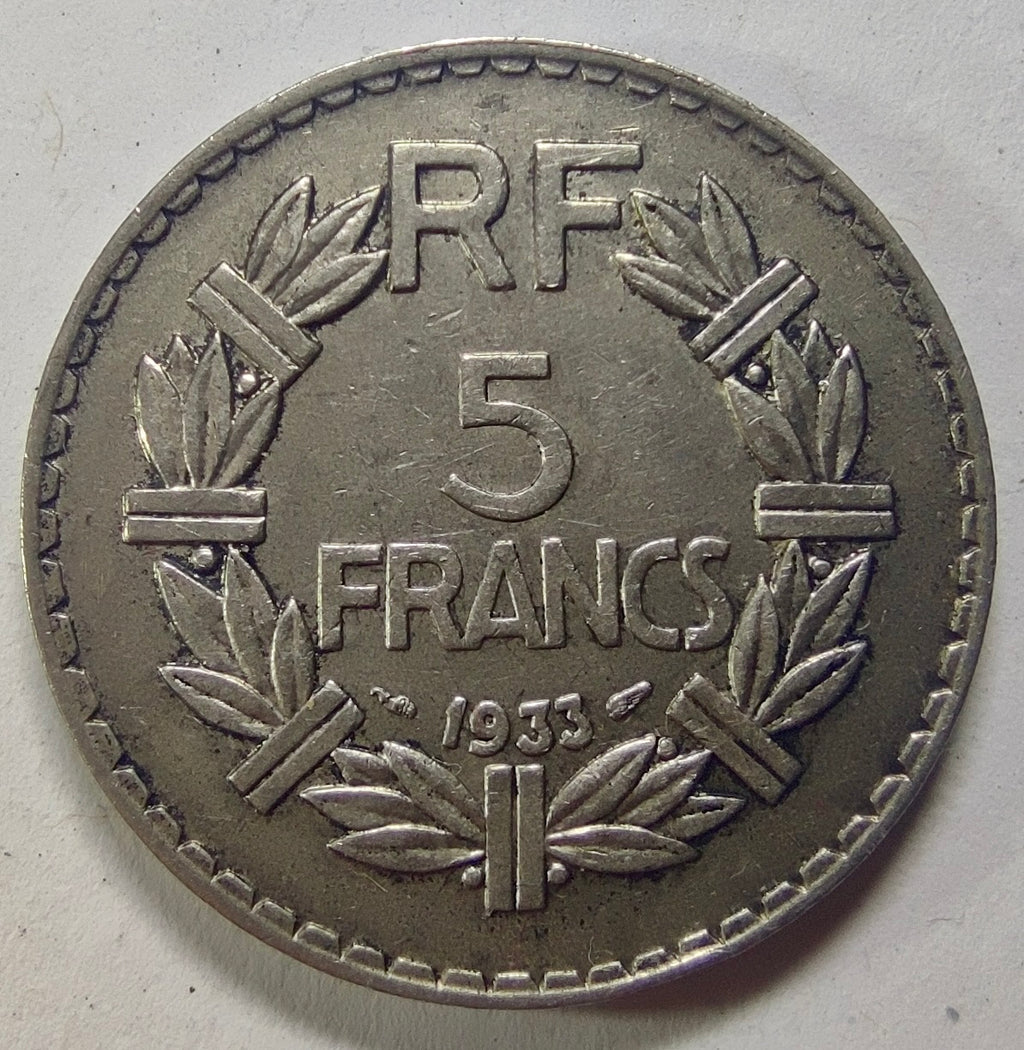 Revers de la 5 francs Lavrillier 1933, valeur et date dans une couronne végétale.